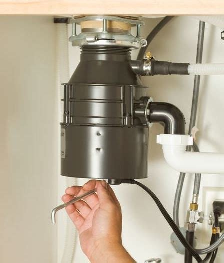 How To Repair Garbage Disposal Humming